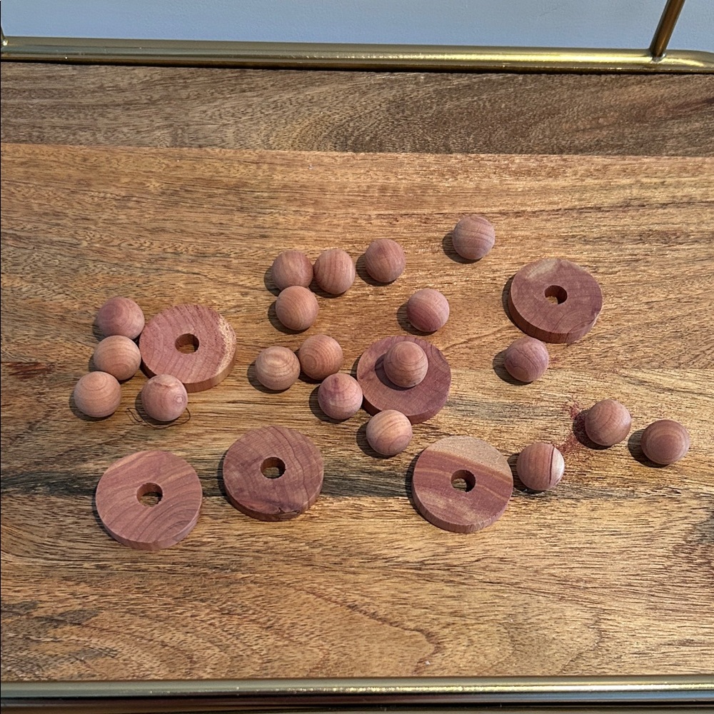Bag of cedar balls and discs